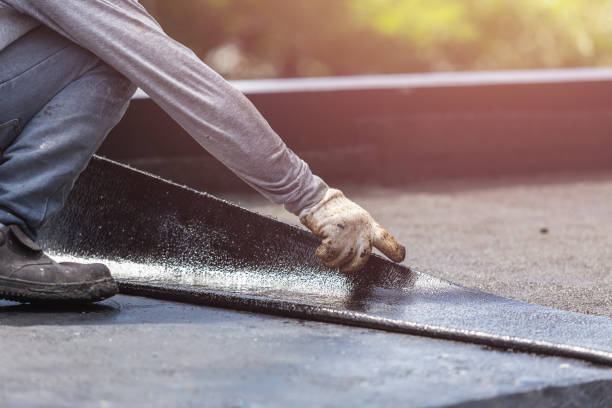 Professional Basement Waterproofing technician working in Lamont, MI